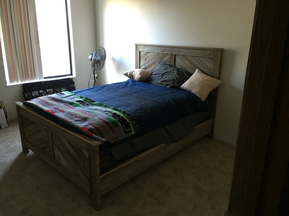 Custom built barn board bed frame